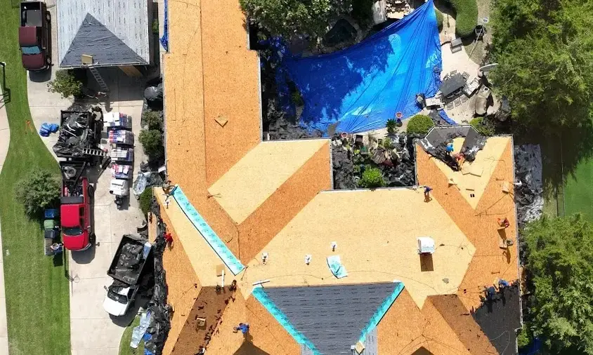 Professional Storm Damage Roof Repair being performed in Bellaire