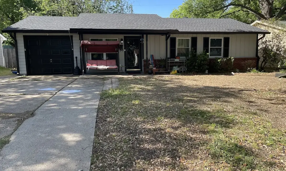 Asphalt Shingle Roof Repair crew at work on a residential roof in Bellaire
